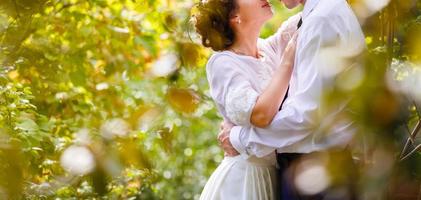 Luxury married wedding couple bride and groom posing in park autumn photo