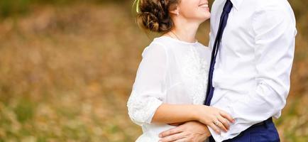 Luxury married wedding couple bride and groom posing in park autumn photo