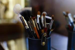 Makeup brushes in the stand photo