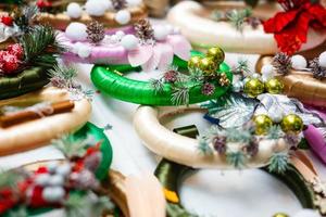 Woman making christmas advent wreath, close up photo