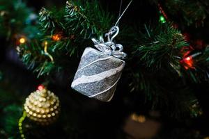 Silver Christmas decorations on the Christmas tree photo