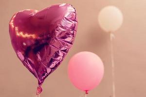 Pink heart balloons photo