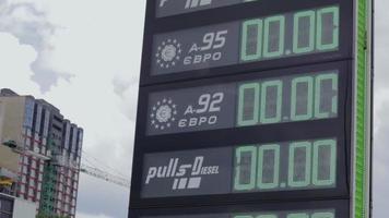 Display of gas stations with prices in Ukraine. Diesel fuel 00.00, gas 00.00. Gas price. Translation DP, GAZ. Shortage and lack of fuel and gas at filling stations. Ukraine, Kyiv - May 23, 2022. video