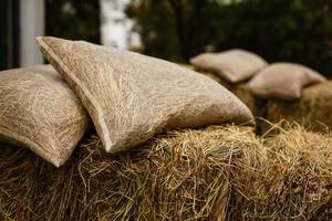 Sheepskin cushion on a straw stack photo