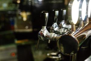 Close up beer dispenser valve photo