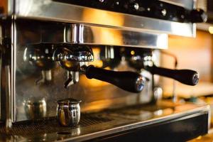 coffee machine preparing cup of coffee. photo