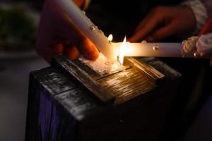 Two advent lights burning Two burning candles Wooden box photo