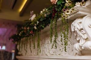 archway of many beautiful flowers, wedding arch with peonies Flowers for a wedding arch photo