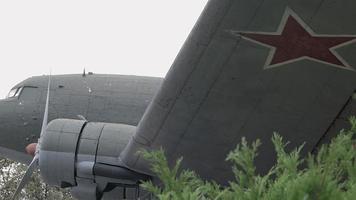 Identification mark of the Air Force of the Russian Federation, a five-pointed red star, bordered by a white stripe on an old Soviet passenger or military transport aircraft from the Second World War. video