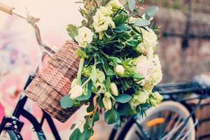 The bicycle and the roses flower bouquet photo