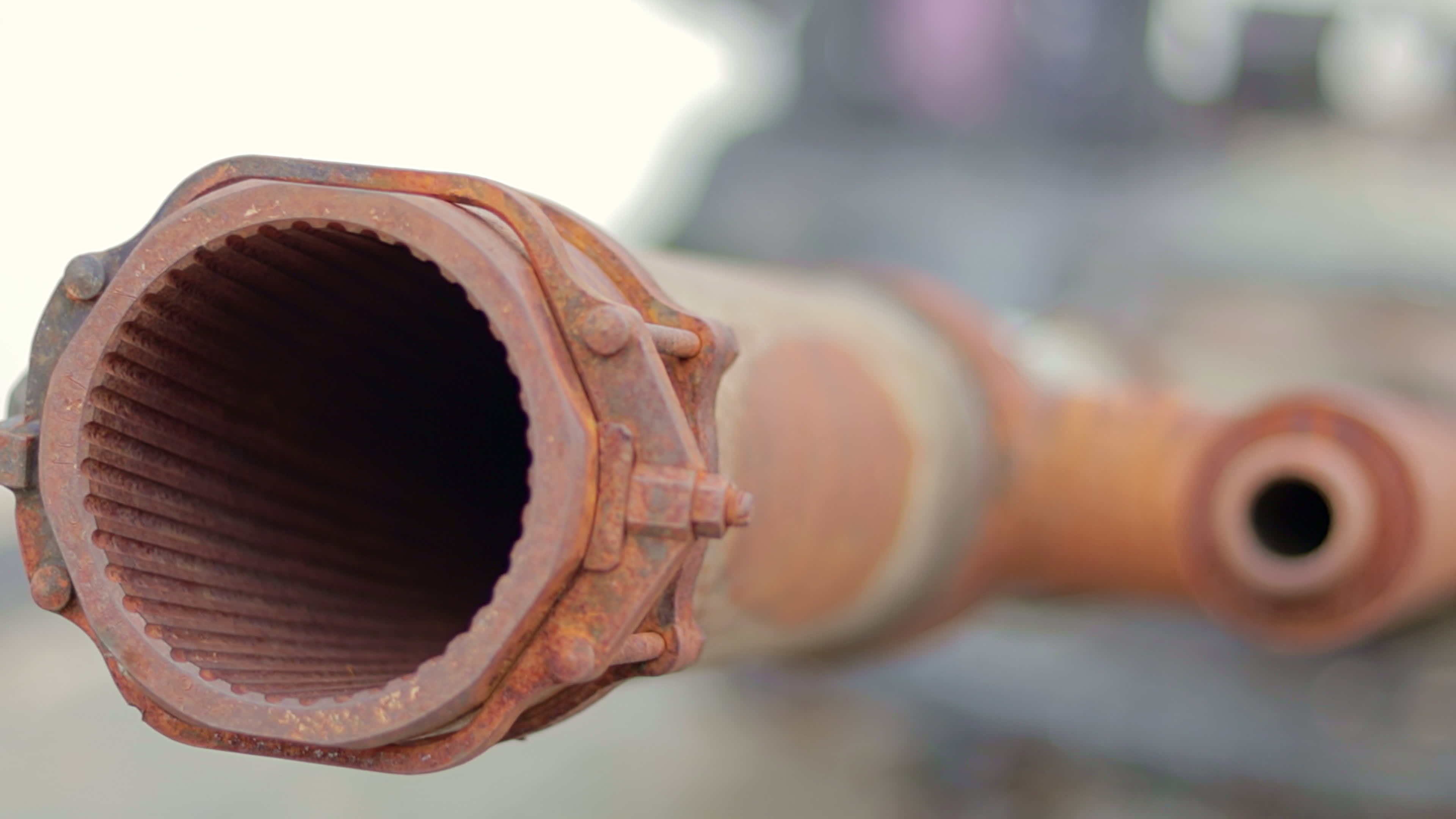 Tank gun, barrel muzzle of a military army closeup. Broken burnt tank. Barrel of a tank gun