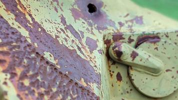 War in Ukraine, a hole in the armor of an infantry fighting vehicle, armor pierced. Texture of green camouflage armored metal with damage and holes. Destroyed military armored personnel carrier. video