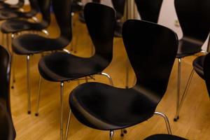 Table and chairs in meeting room. photo