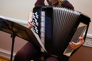 Accordion player The musician playing the accordion player instrument photo