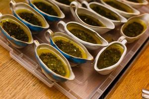 soup in jugs on a tray photo