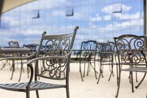 Tables and chairs in cafe photo