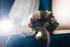 Wedding bouquet of pink roses and peony photo