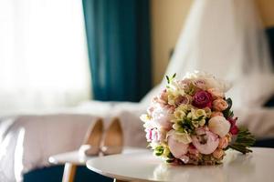 Wedding bouquet of pink roses and peony photo