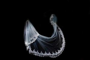 wedding white Bridal veil on black background isolated photo