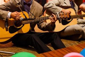 Detail of a classical guitar player photo