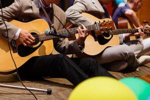 Detail of a classical guitar player photo