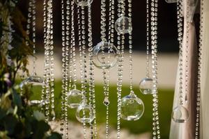 Glass sphere with candle inside. Beautiful wedding decoration. photo