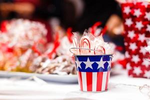Delicious with American flag decor on table on background photo