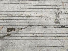road wall texture background with lines and cracks photo
