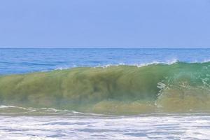 Extremely huge big surfer waves at beach Puerto Escondido Mexico. photo