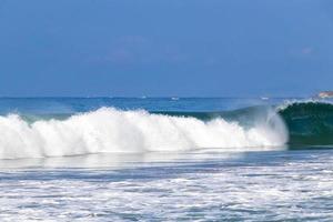 Extremely huge big surfer waves at beach Puerto Escondido Mexico. photo