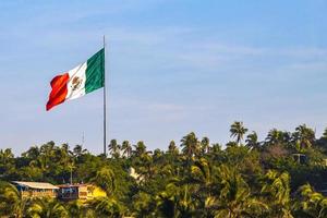 Mexican green white red flag in Zicatela Puerto Escondido Mexico. photo