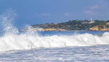 Extremely huge big surfer waves at beach Puerto Escondido Mexico. photo