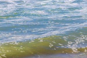 Extremely huge big surfer waves at beach Puerto Escondido Mexico. photo