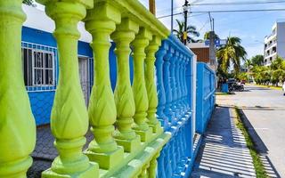 Green stone columns as fence in  Playa del Carmen Mexico. photo