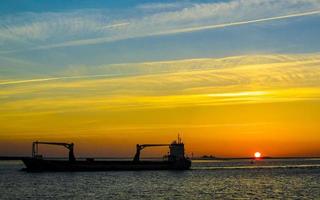 Beautiful colorful golden sunset North Sea coast Bremerhaven to Nordenham. photo