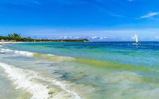 Tropical caribbean beach clear turquoise water Playa del Carmen Mexico. photo