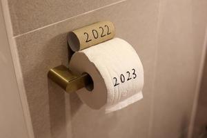 Toilet papers written as 2022 and 2023 which means see the old year go and welcome the new year in photo