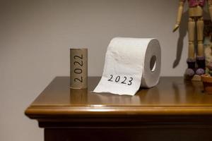 Toilet papers written as 2022 and 2023 which means see the old year go and welcome the new year in photo
