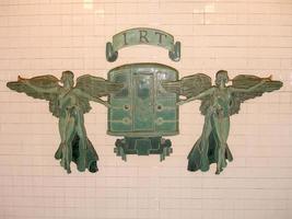 New York City  February 3 2009   IRT Interborough Rapid Transit Company New York City Subway sign at Grand Army Plaza Brooklyn New York Two trumpeting angels flanking an early 1900s train photo