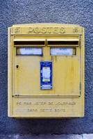 Yellow French Post Box in Bourges France Labeled Posts it asks not to throw newspapers into the box photo