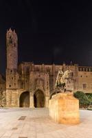 Ramon Berenguer III Count of Barcelona  Statue of Ramon Berenguer III 10861131 in the homonymous square at night In the background the Chapel of St Agata Barcelona Catalonia Spain photo