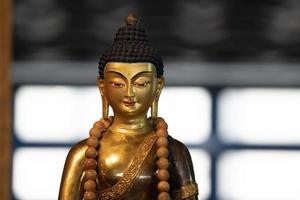 Japanese Buddah statue isolated close up photo