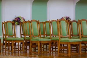 Fragment of empty conference hall, rows of a chairs photo