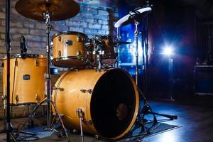 Modern drum set shot in smoky dark studio photo