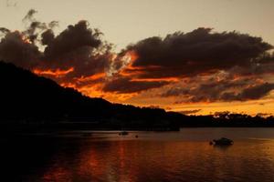 View of sunset over mull island, scotland photo