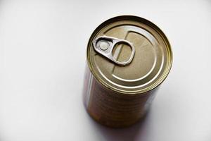 The lid of a tin can on a white background. A tin can. photo