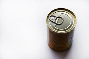 The lid of a tin can on a white background. A tin can. photo