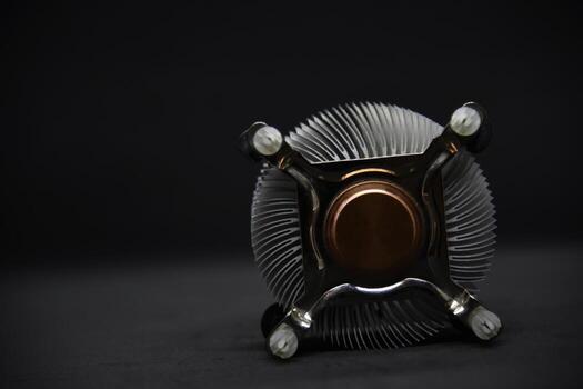 Aluminum radiator for cooling the computer processor on a black background. CPU cooling. photo