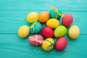 Easter Eggs background. Colorful egg. Top view and mock up. Holiday fun. Food design. Selective focus photo