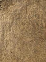 Old paper with stains and folds. Grunge paper texture for background photo
